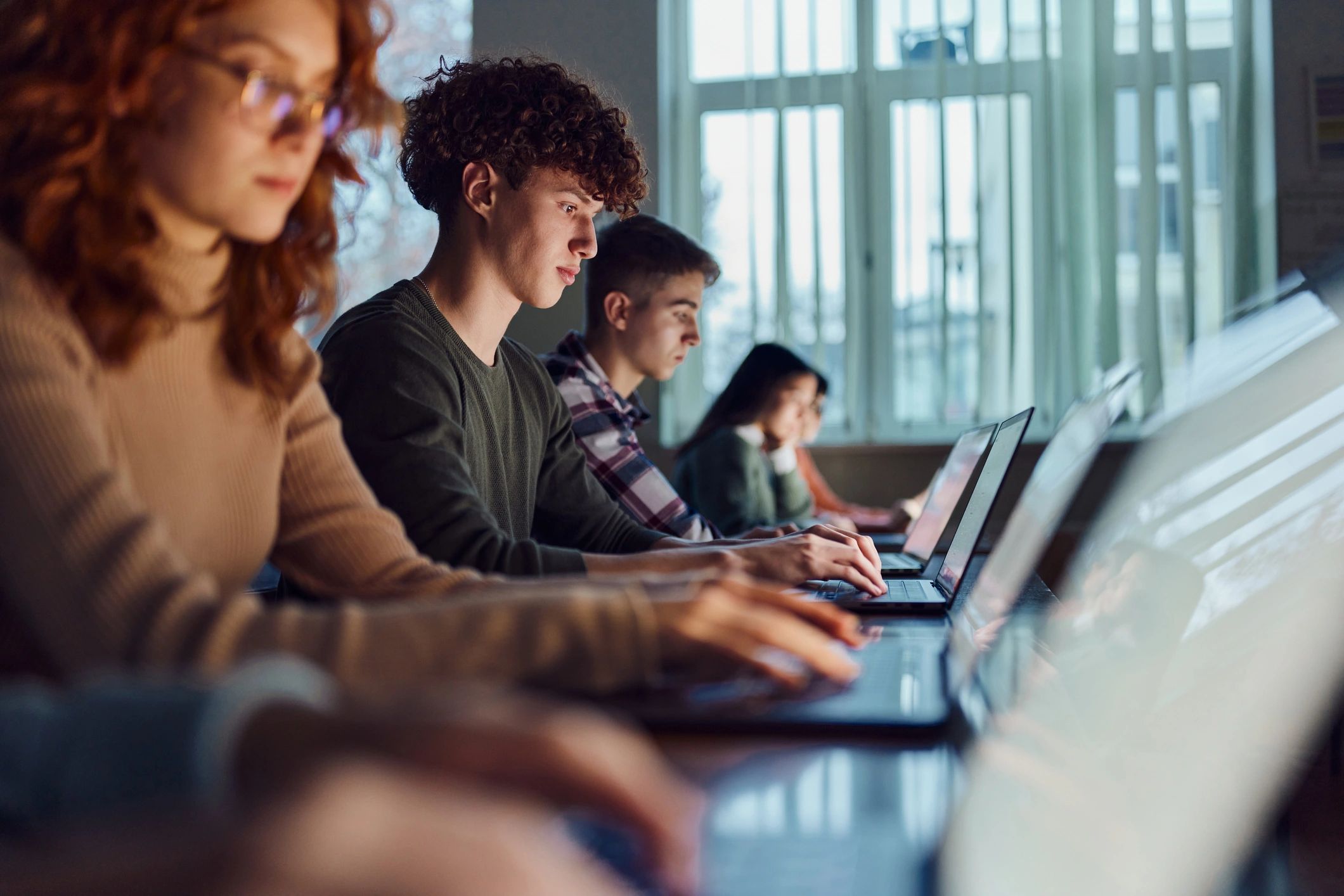 High school students e-learning over computers in the classroom